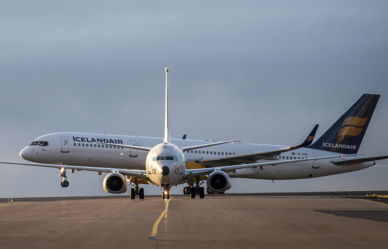 Breyta flugskýli og byggja flugvélaþvottastöð