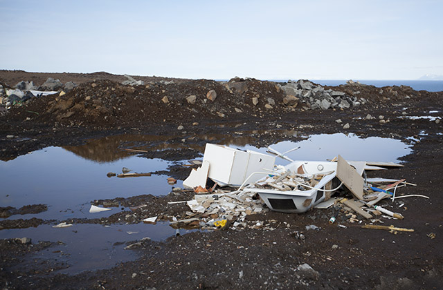 Falast eftir jarðvegstipp